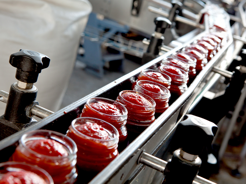 organic tomato paste in glass jar